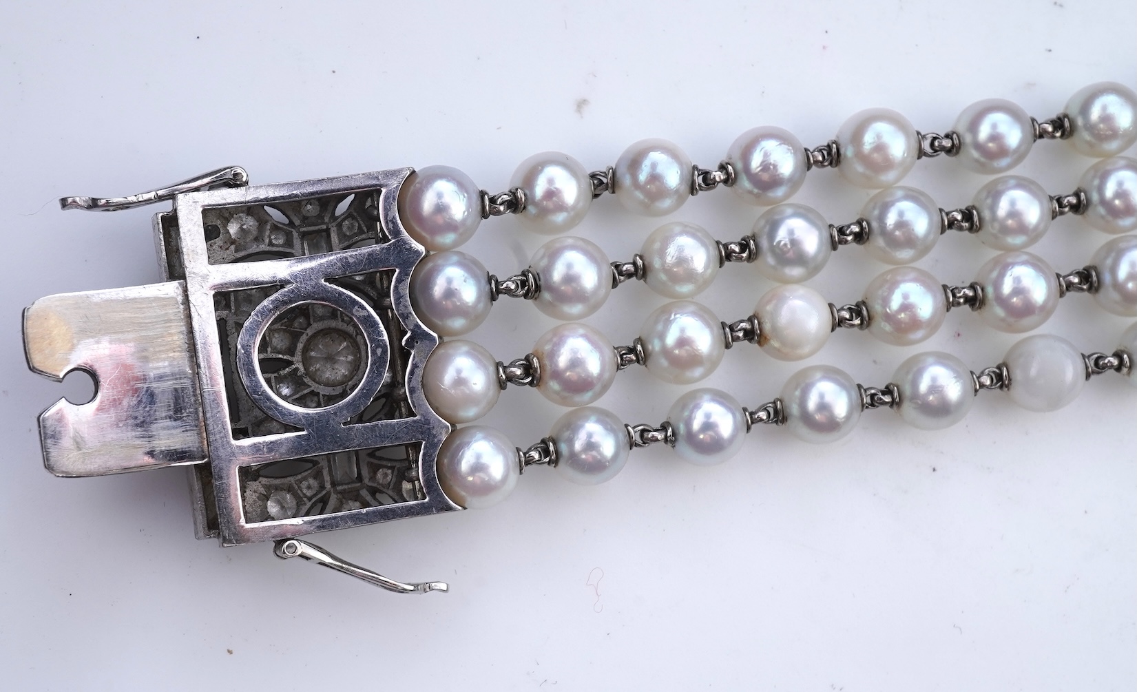 A cultured pearl and diamond bracelet